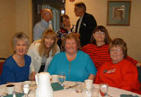 Marlyn McKean Cook, Sandy Dickson, Cherylin Salmela Serocky, Jane Woodman Amerighi; back row: Dick Sleyster, Dick's spouse, Ron Allen 